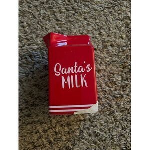 Santa's Milk Glass container red with white‎ writing